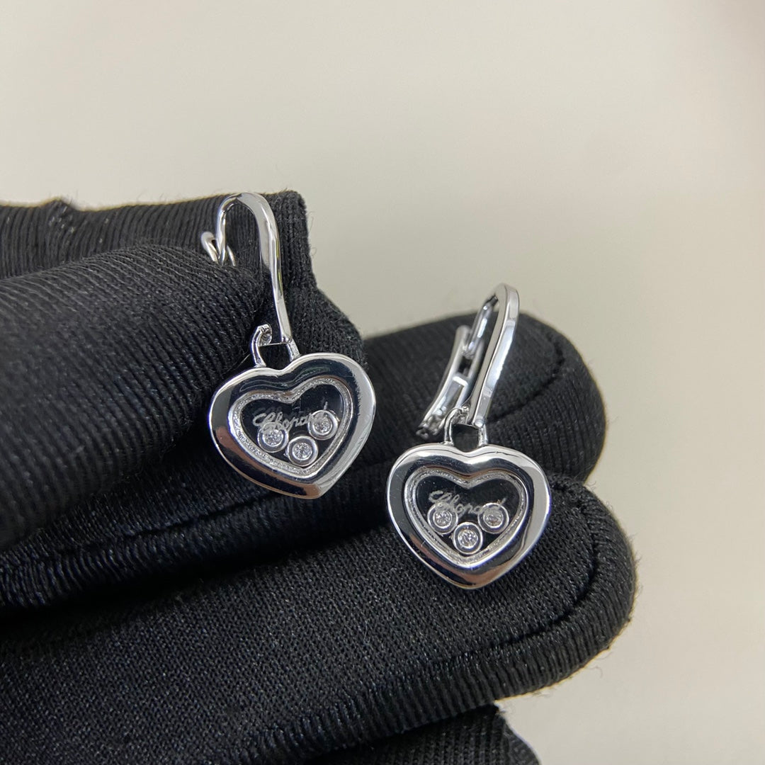 Shiny three-diamond heart earrings, white-gold heart with three round diamonds