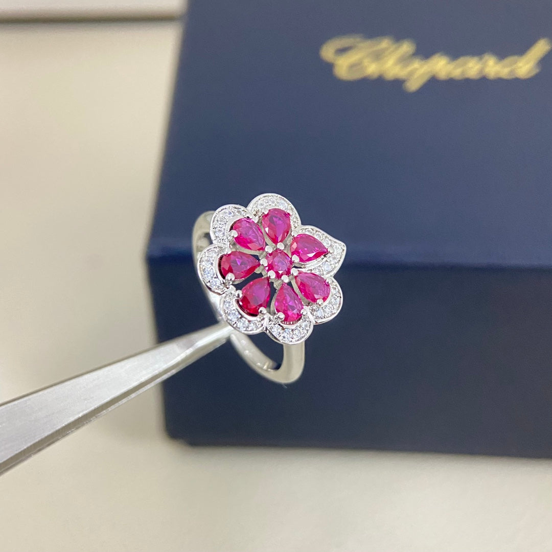 White gold openwork petal diamond ring with pink stones