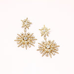 Vintage star crystal drop earrings, gold-tone with clear eight-point crystal stones.
