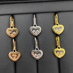 Heart earrings set: rose gold, white gold, and gold-tone hearts with three diamonds