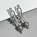 Silver-tone earrings with gray pearls, glitter bar links and pointed bow tips