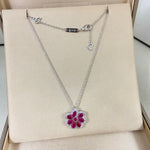 Chopard lace flower pendant necklace with magenta gemstone flower pendant on silver chain