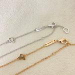 Chopard necklace chain and clasp with engraved bar and heart-shaped connector on links