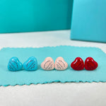 Enamel heart stud earrings in blue, pink, and red