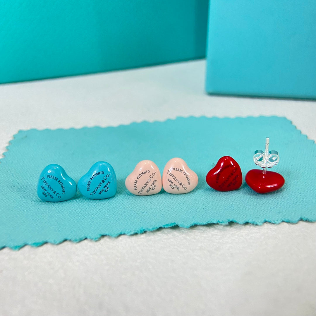 Assorted enamel heart stud earrings: blue, pink, and red