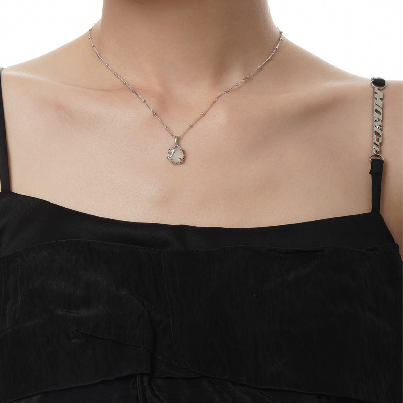 Organic Form Silver Claw Setting Necklace

