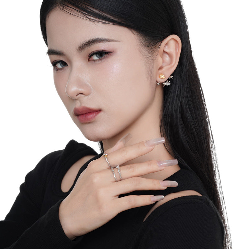 Wavy Silver Ring with Star Accents

