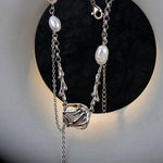 Avant-garde Silver Necklace with Irregular Pearls

