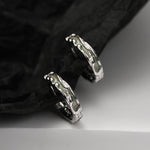 Small Hoop Earrings with an Uneven, Rough-Hewn Texture

