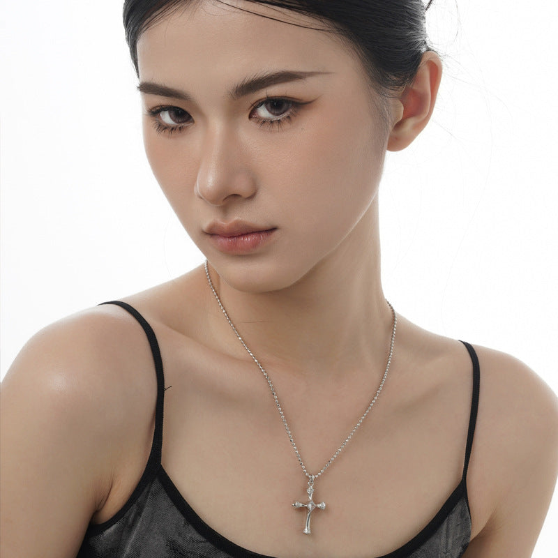 Polished Silver Cross with Geometric Detailing

