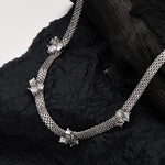 Elegant Silver Collar Necklace with Dainty Pendants

