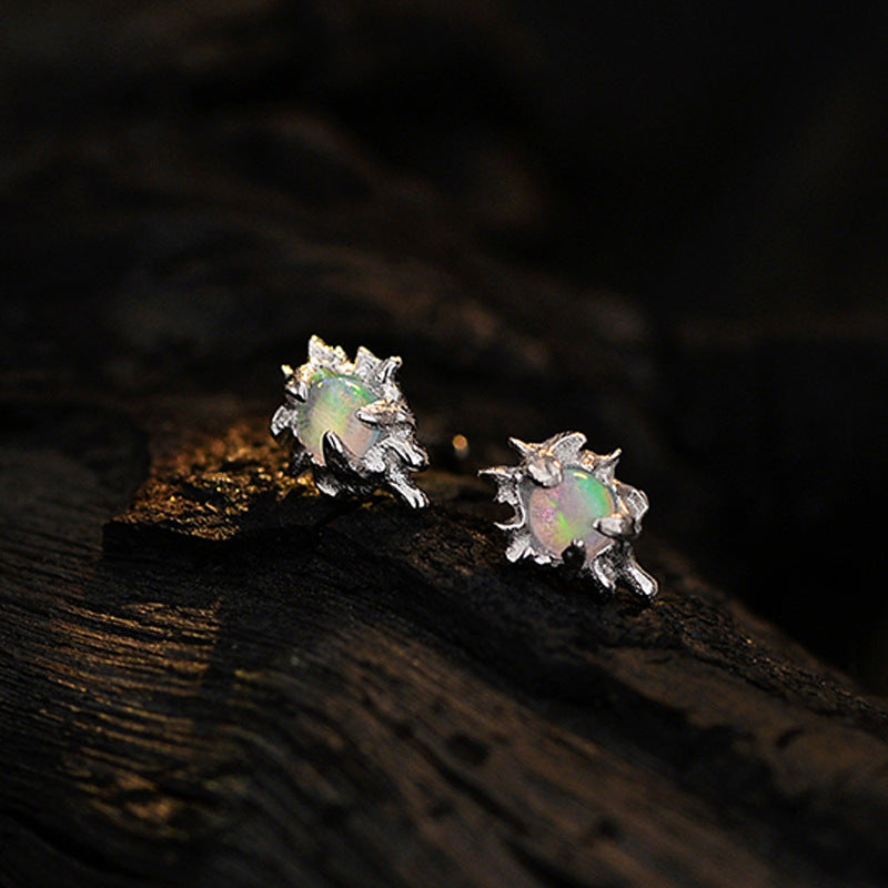Two-Tone Silver Studs with a Luminous Stone

