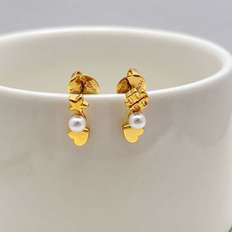 Gold-tone heart and star earrings with white pearl drops, asymmetrical dangle style