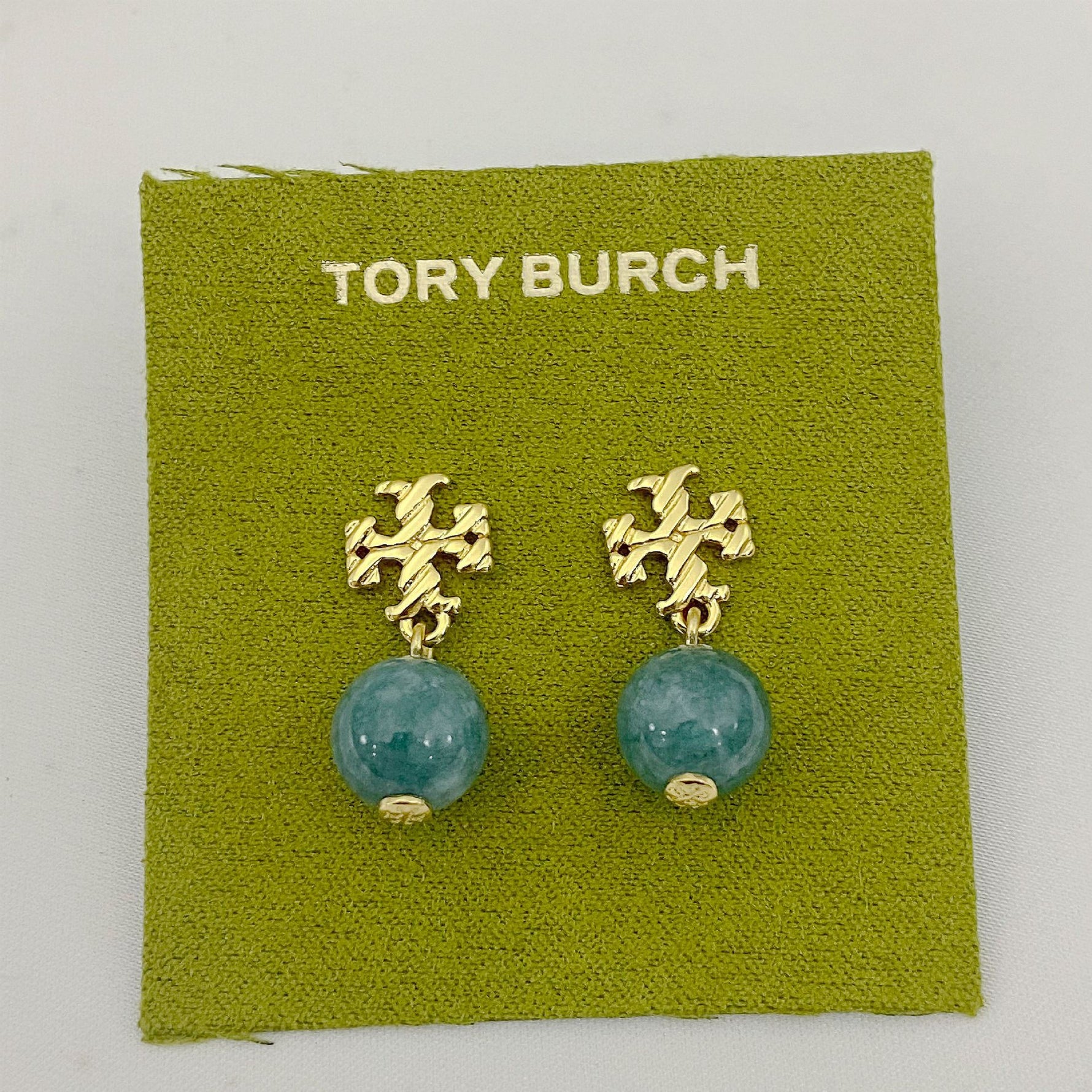 Teal/green round agate pendant earrings with gold-tone geometric drop details