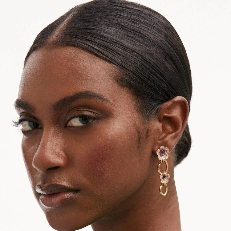 Gold diamond floral drop earrings with white crystals and dangling hoop links