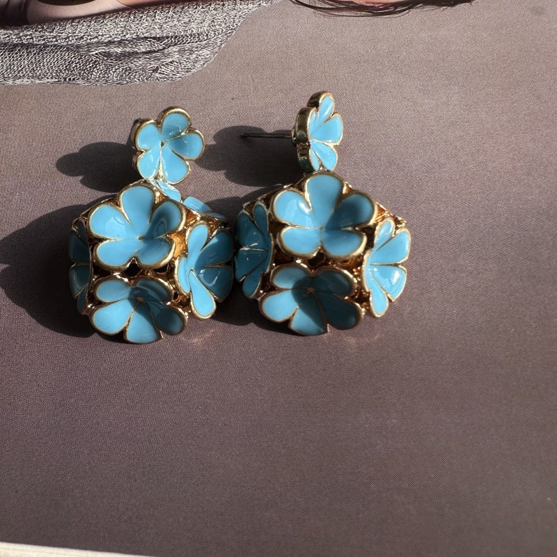 Enamel hydrangea earrings, light-blue enamel petals with gold-tone frames