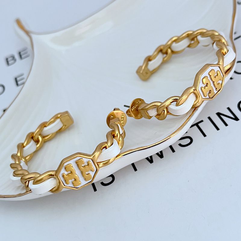 Tory Burch logo hoop earrings with gold chain and white enamel links, gold posts