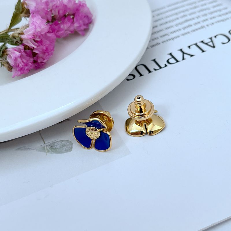 Enamel Camellia stud earrings, blue front with gold-tone butterfly backs