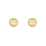 Round gold metal stud earrings with miu miu logo, matching pair