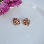 Rose gold square stud earrings with openwork rhinestones and cutout center