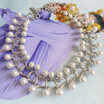 Silver pearl intertwined-link necklace with dangling pearl drops