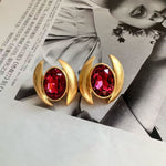 Oval Sparkling Crystal Earrings: red oval crystals with gold crescent settings