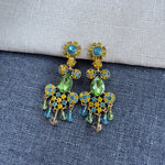 Rhinestone tassel clip-on earrings in green and blue with gold chain fringe