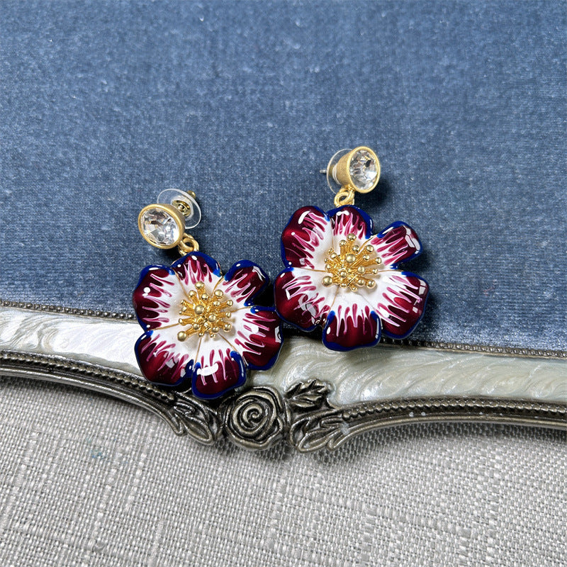 Vintage enamel cherry blossom earrings in dark red and white with gold beaded centers