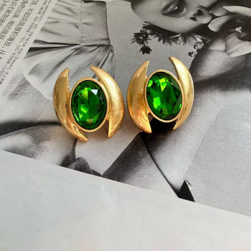 Oval Sparkling Crystal Earrings: emerald green oval crystals in gold crescent frames