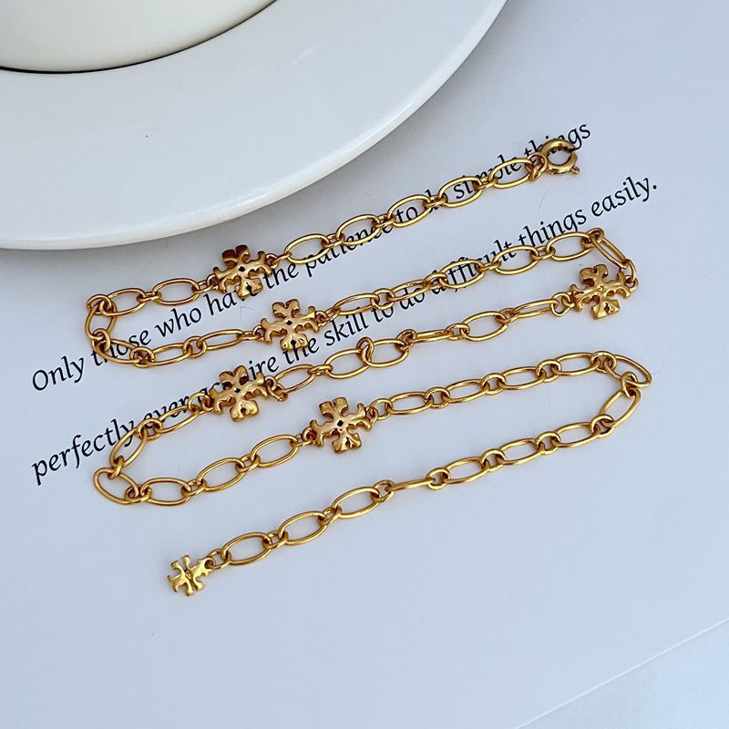 Gold-tone chain necklace with interlocking logo link charms