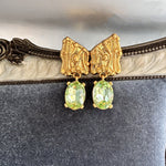 Gold-tone crystal drop earrings with light-green oval stones