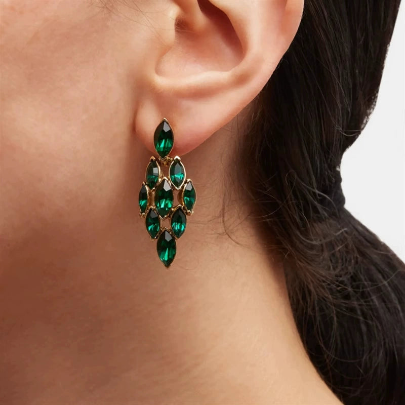 Green rhinestone chandelier earrings with marquise stones and gold-tone setting