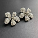 Large pearl flower earrings with clustered faux pearls and rhinestone centers