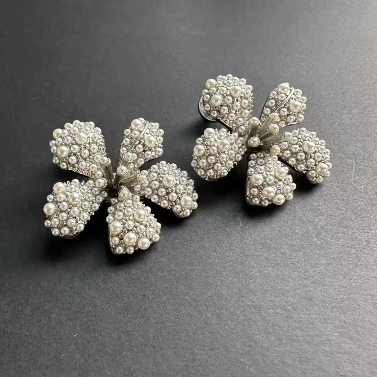 Large pearl flower earrings with clustered faux pearls and rhinestone centers