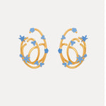 Blue enamel geometric hoop earrings with small star and flower motifs