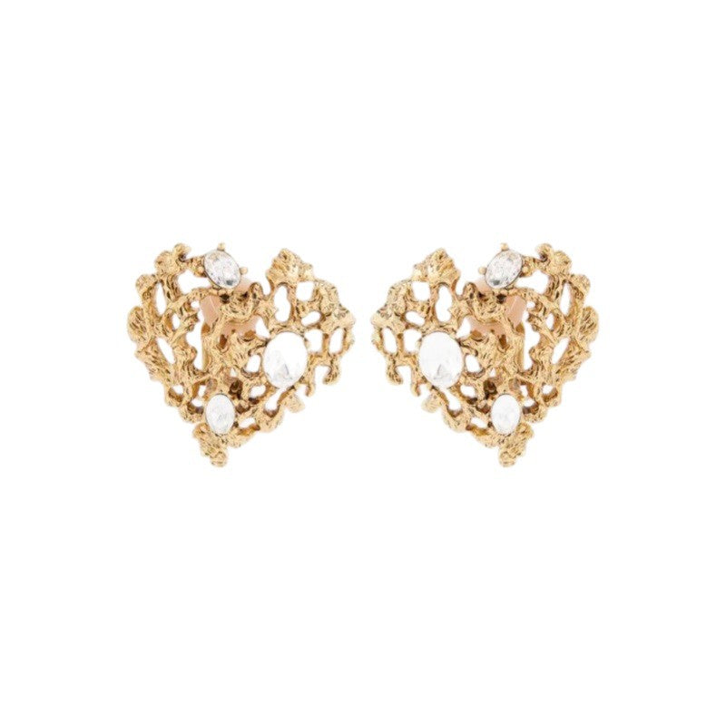 Pair of openwork heart earrings with round clear crystals, gold-tone studs