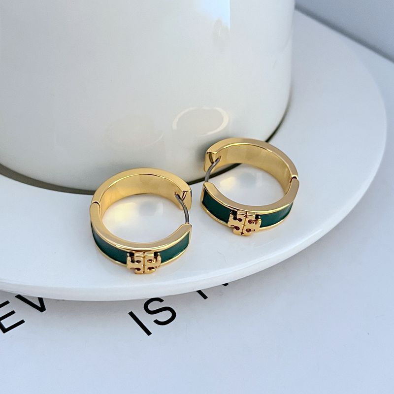 Gold-tone enamel hoop earrings with green round band and gold emblem front