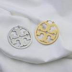 Silber- und goldfarbene runde Vintage-Ohrringe mit Cut-out-Muster