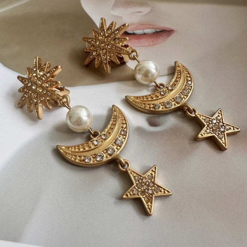 Gold star-moon drop earrings with pearls, sparkling crescent moons and star dangles