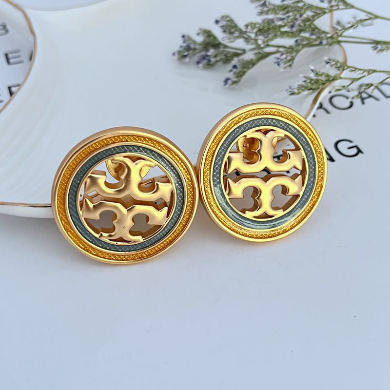 Gold round enamel openwork metal stud earrings, geometric cutout pattern