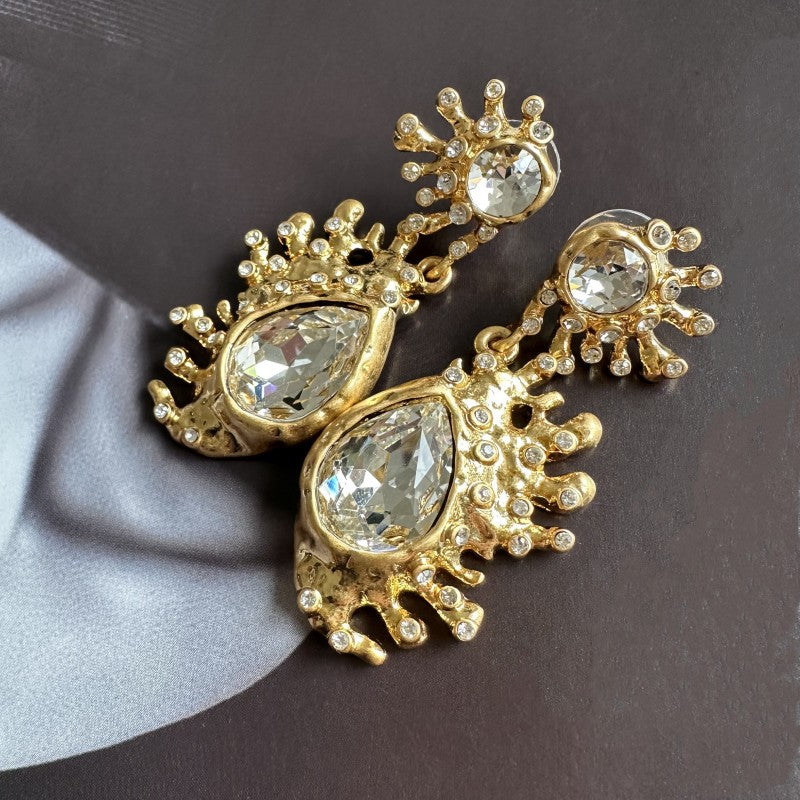 Cactus crystal dangle earrings in gold-tone with clear teardrop stones and tiny crystals
