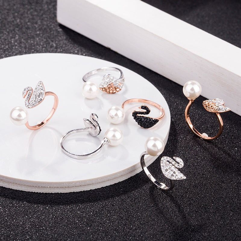 Swan pearl open ring set with white pearls, black and rose-gold swan details, crystal pavé