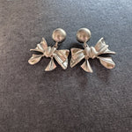 Silver-tone bow drop earrings with round stud tops and ribbon bow charms