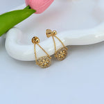 Gold pavé rhinestone hoop drop earrings, leopard-pattern round charms