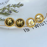 Round metal stud earrings set, gold-tone rims with dark green and white faces