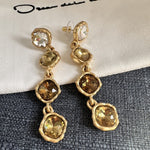 Full-crystal square drop earrings with coffee-brown stones in gold-tone settings