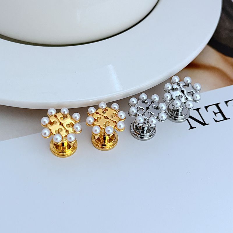 Pearl openwork metal stud earrings in gold and white gold tones with clustered pearls