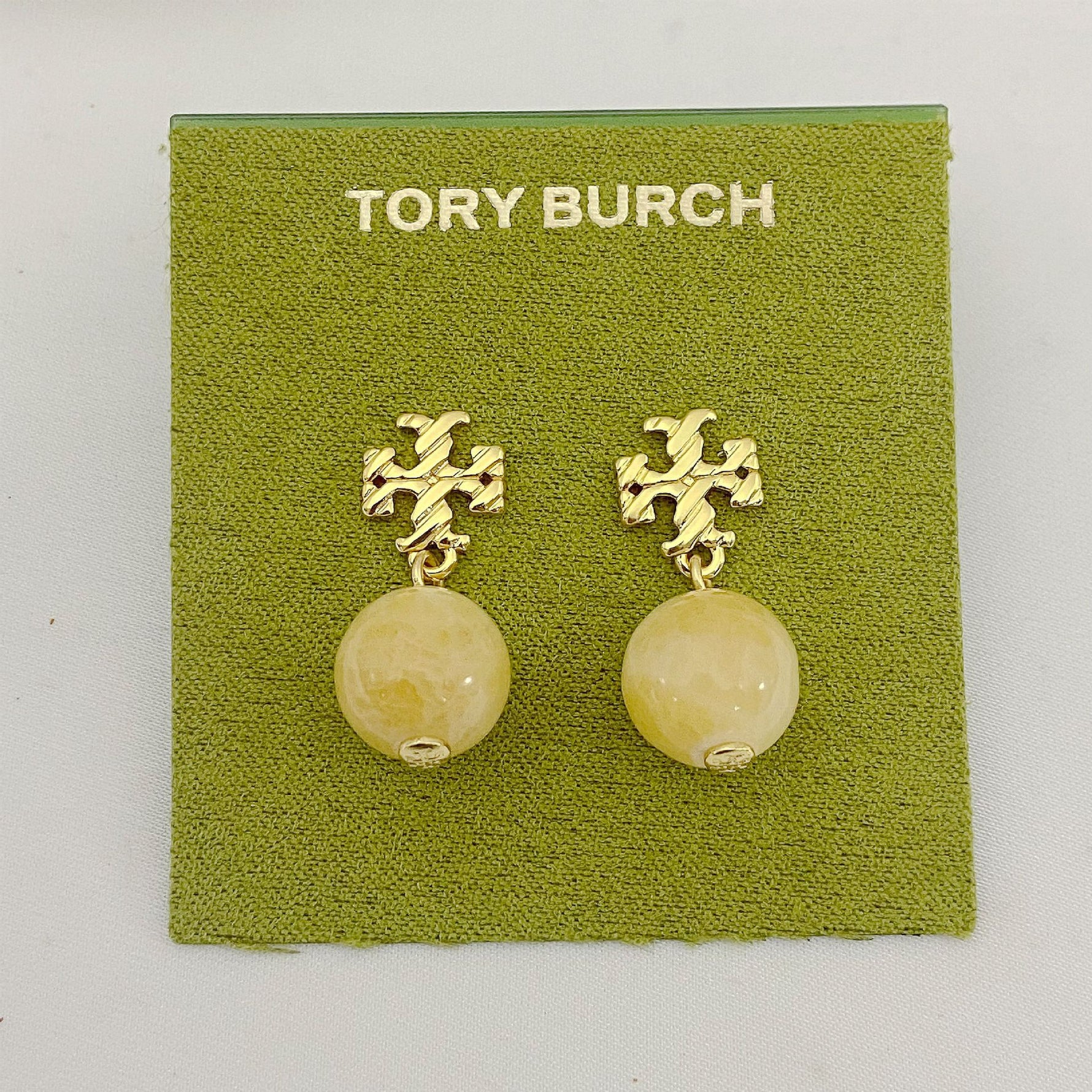 Off-white agate pendant earrings with gold logo stud and round bead drop