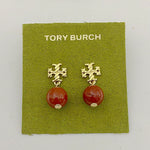 Orange-red round agate pendant earrings with gold-tone geometric drop details