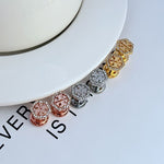 Hexagonal stud earrings with openwork diamond pattern: rose, gold, white gold